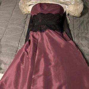 Strapless purple knee length dress with black lace